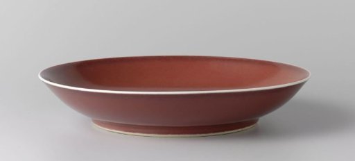 Saucer-dish with a red glaze