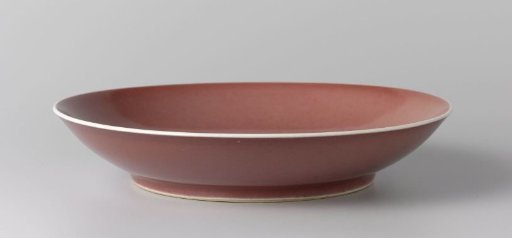 Saucer-dish with a red glaze