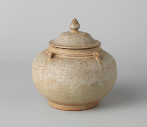 Ovoid covered jar with a light blue glaze