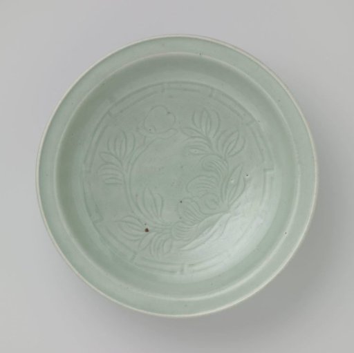 Dish with an incised flowering plant