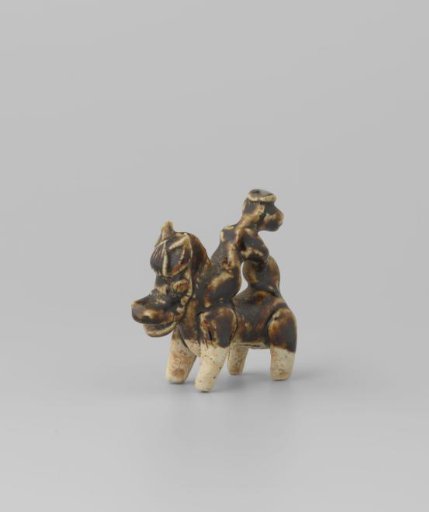 Monkey riding horse backwards