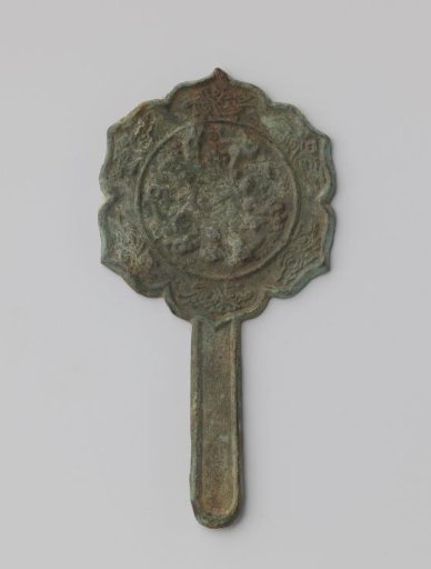 Mirror, six-lobed leaf-shaped, border of plant motifs around round medallion, with flat handle