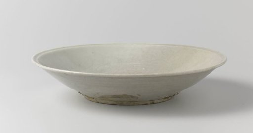 Saucer-dish with an incised landscape and foliate decoration