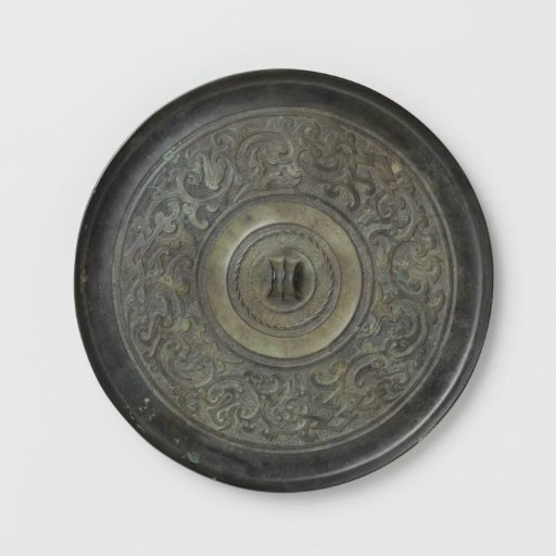 Mirror with stylized bird-dragon motifs