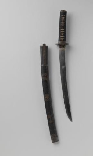 A menuki in the form of two dolls and one in the form of a basket; rectangular tsuba with relief decoration; kozuka