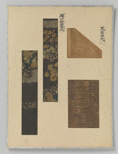Four textile fragments on a sheet, embroidery on silk