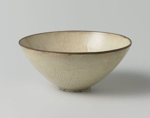 Bowl with an incised floral scroll