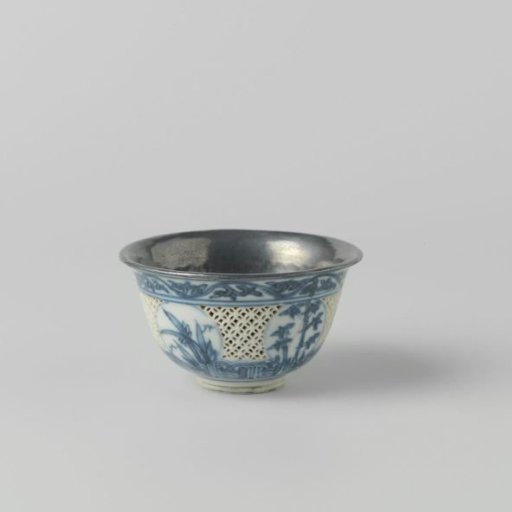Bowl with incised sides, flowering plants and silver mounts