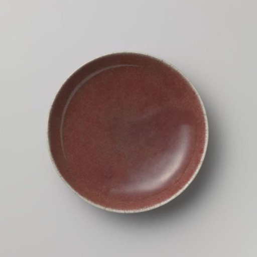 Saucer dish with a crackled red glaze