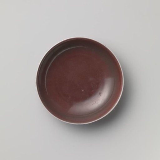 Saucer-dish with a red glaze