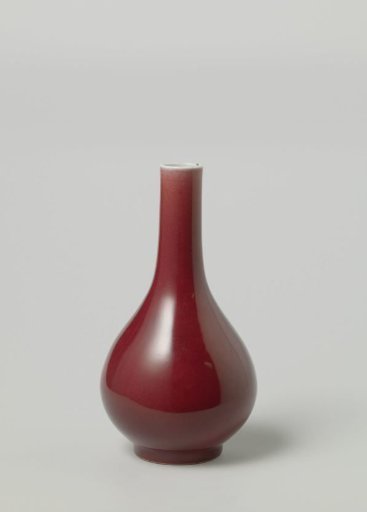 Pear-shaped bottle vase with a red glaze