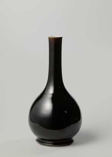 Pear-shaped bottle with a dark brown glaze