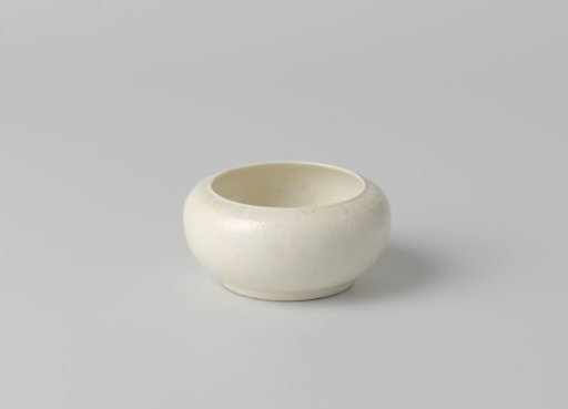 Bowl with rounded sides and a band of scroll work