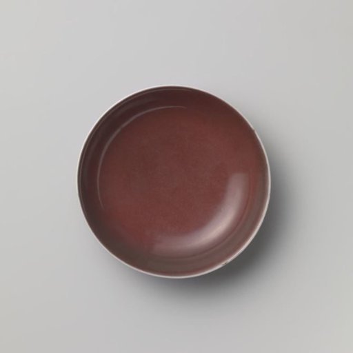 Saucer-dish with a red glaze