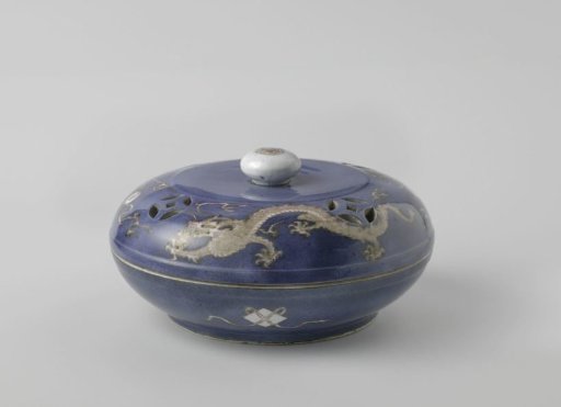 Box with dragons and pierced cover