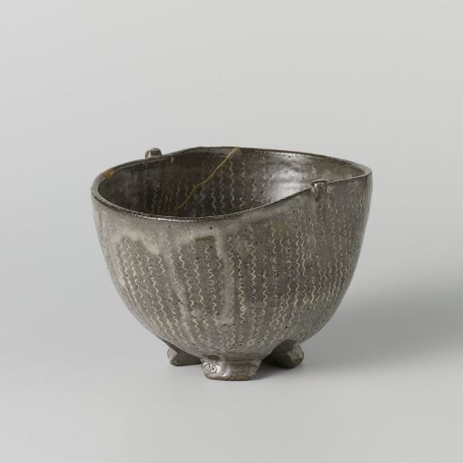 Tea bowl with flowers and waving lines