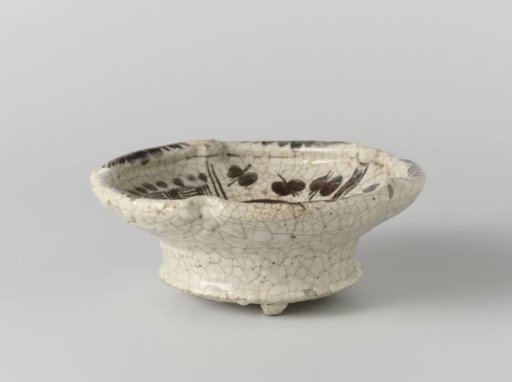 Dish with geometrical motifs and stylized flower sprays