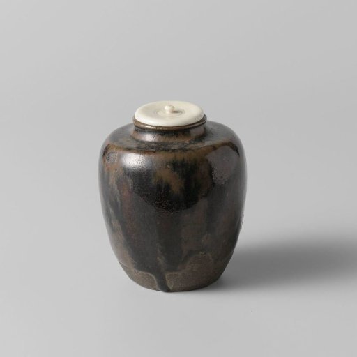 tea caddy with a brown black glaze