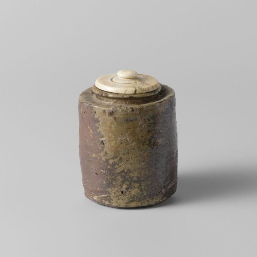 Cylindrical tea caddy with a green brown glaze