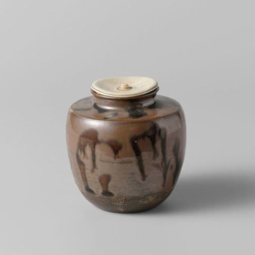 Tea caddy with a brown spotted glaze