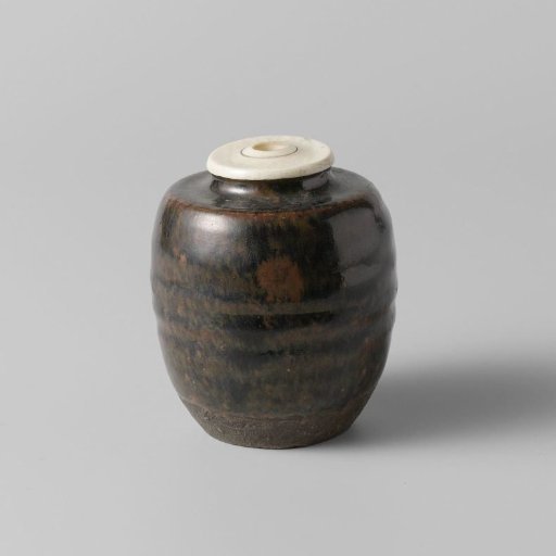 Tea caddy with a brown black glaze