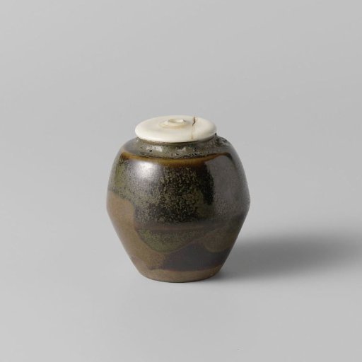 Tea caddy with a green brown glaze