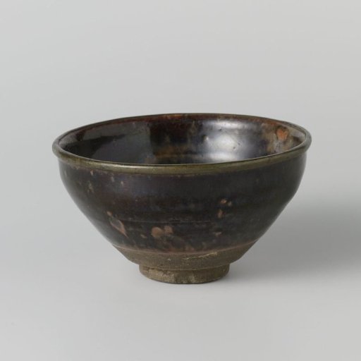 Teabowl with a black brown glaze
