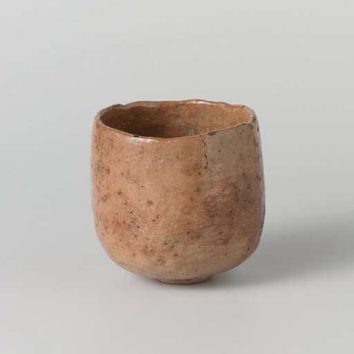 Teabowl with an orange red glaze