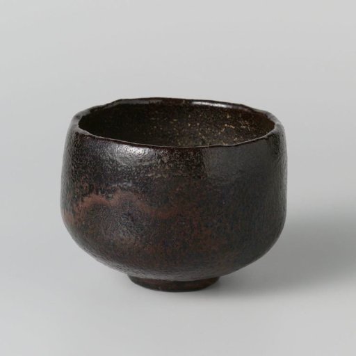 Teabowl with a black brown glaze