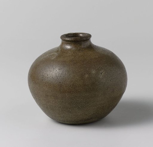 Bottle with a green brown glaze