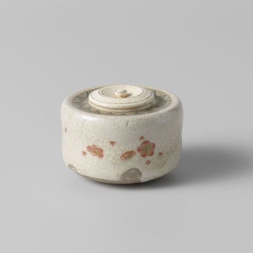 Tea caddy with prunus blossoms and an ornamental border