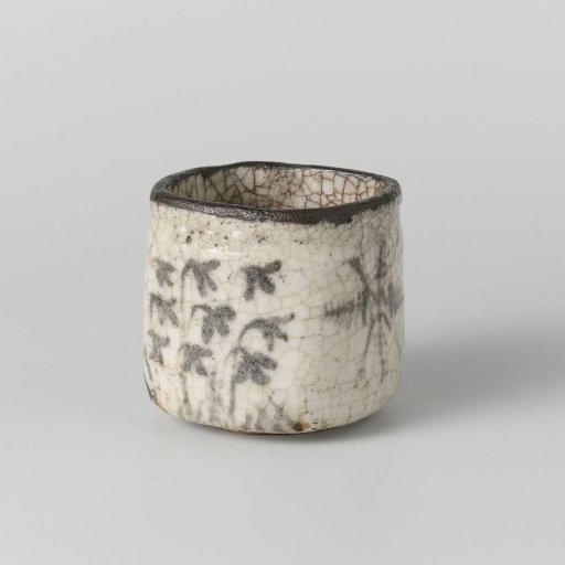 Charcoal burner with plants and a frame