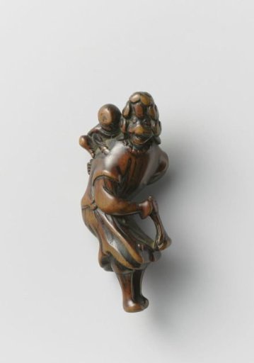 Netsuke in the form of a Dutch woman with child
