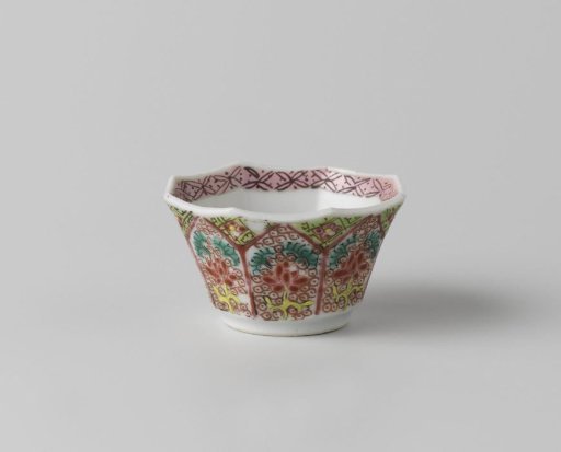 Octagonal cup with floral scrolls in petal-shaped panels