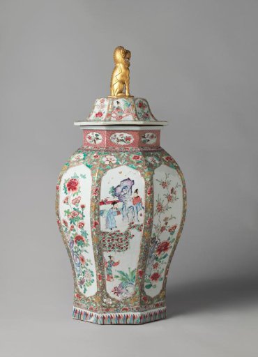 Octagonal, ovoid covered jar with flowering plants and figures in a fenced garden in panels