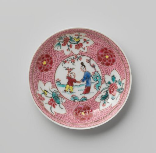 Saucer with a woman and boy in a landscape and flower sprays on diaper-pattern