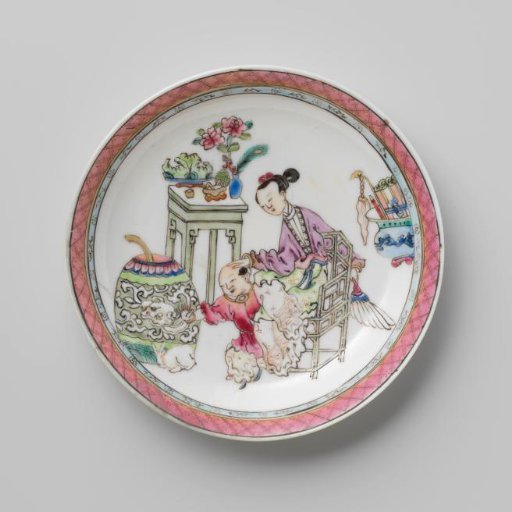 Saucer with a woman, boy and rabbit