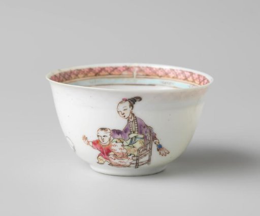 Bell-shaped cup and saucer with a woman, boy and rabbit