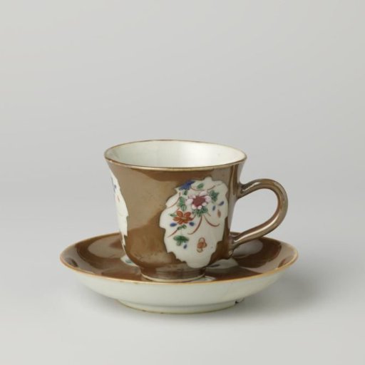 Chocolate cup and saucer with flower sprays in panels on a brown glaze