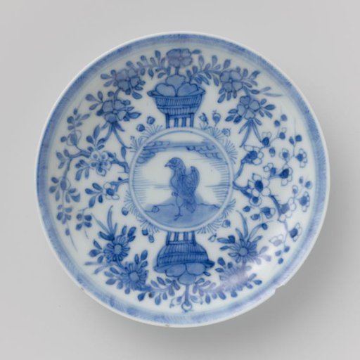 Saucer with a bird of prey, flower basket and plants