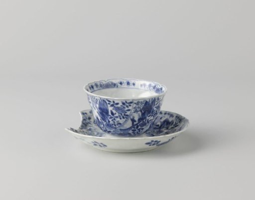Cup and saucer with twisted panels with landscape or flower spray