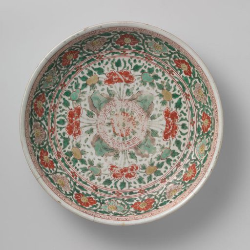 Saucer-dish with a roundel, flowering plants near rocks and floral scrolls