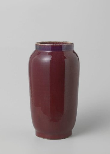 Elongated, ovoid vase with a red glaze
