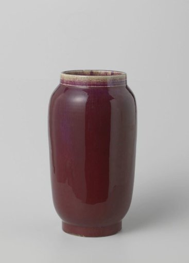 Elongated, ovoid vase with a red glaze