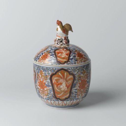 Covered jar with hoo-birds in panels on a ground of lotus and floral scrolls