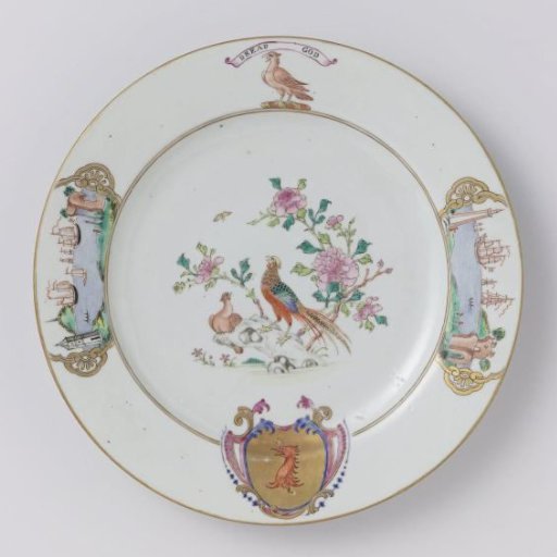 Plate with two pheasants on a rock near flowering plants and the arms of the Munro family