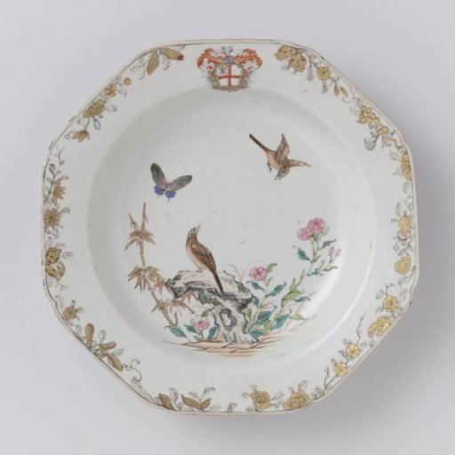 Octagonal soup plate with the arms of the Darcet family and two birds and flowering plants near a rock