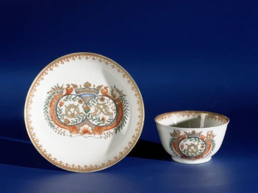 Bell-shaped cup and saucer with a crowned double monogram