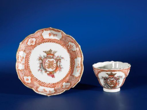 Cup with a monogram in a crest in a medallion