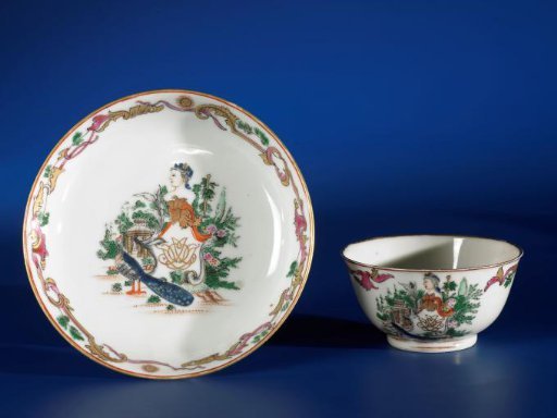 Saucer with an elaborately decorated monogram 'IDF'